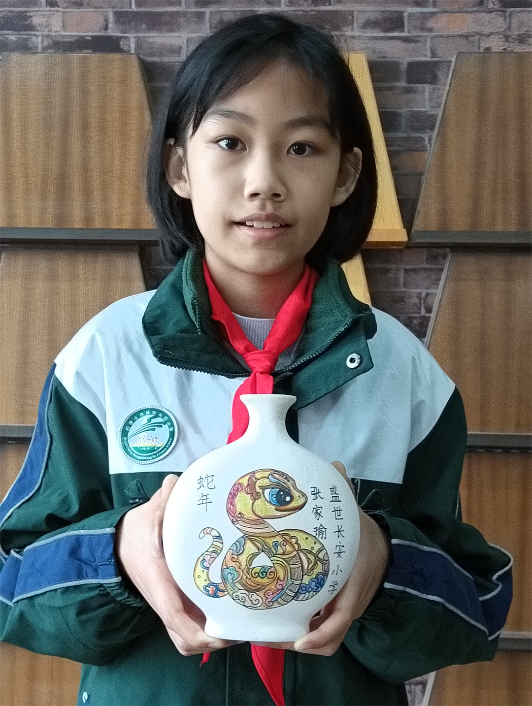 1735783365545301.jpg 弘揚(yáng)傳統(tǒng)文化——盛世長(zhǎng)安小學(xué)陶藝社團(tuán)迎新年手作生肖“蛇” 活動(dòng).jpg